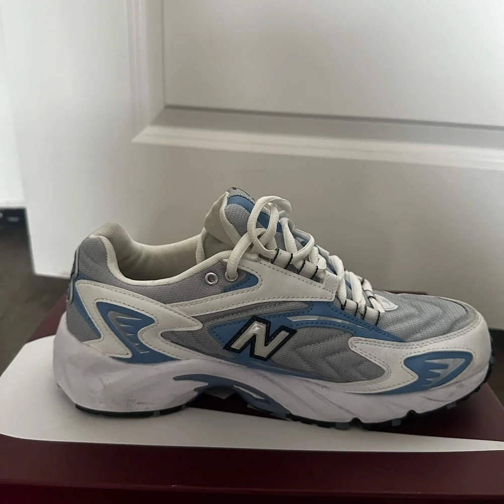 New Balance White and Light Blue Athletic Shoes - Picture 1 of 1